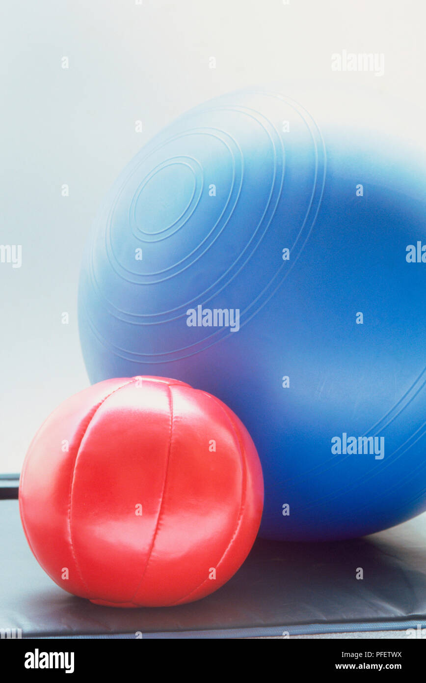 Two balls, a medicine ball and stability ball Stock Photo Alamy