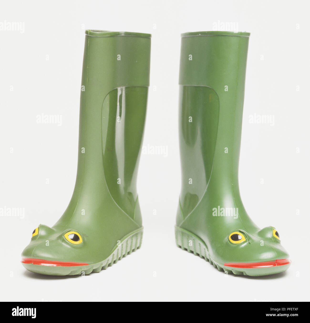 Green wellington boots with frog's faces on the front Stock Photo - Alamy