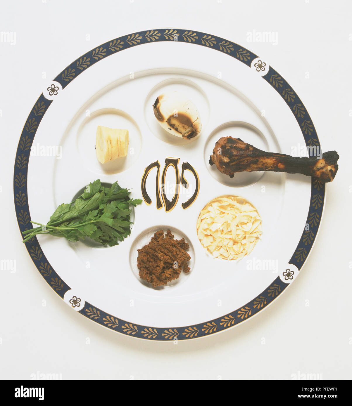 Passover meal or Seder plate, displaying traditional bitter herb, egg