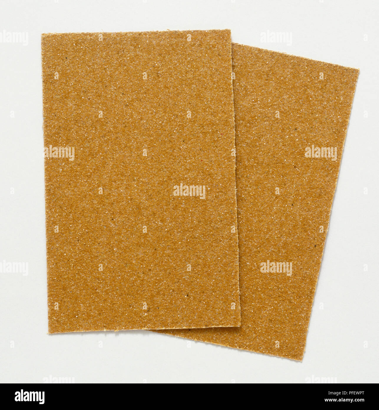 https://c8.alamy.com/comp/PFEWPT/two-rectangular-pieces-of-sandpaper-PFEWPT.jpg