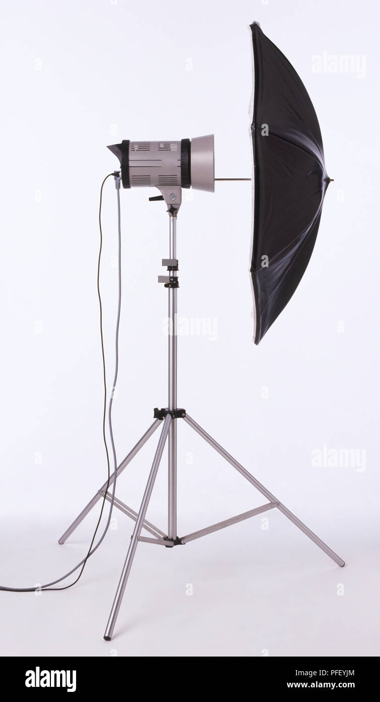 Umbrella mounted to tripod Stock Photo Alamy