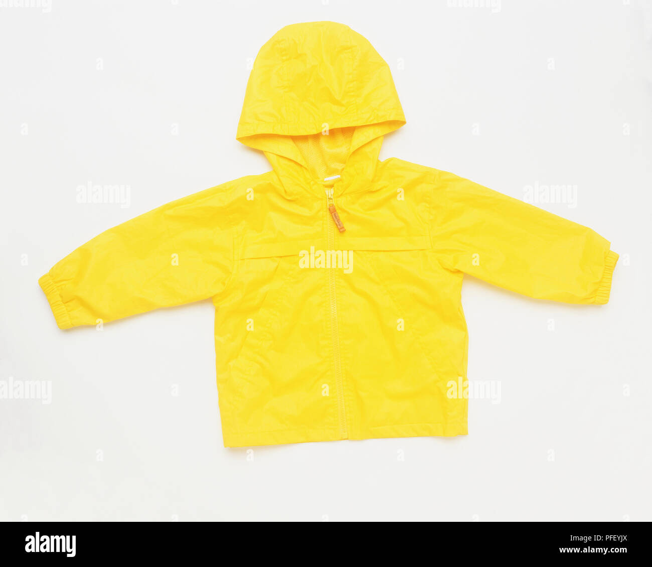 Yellow rain jacket with hood Stock Photo Alamy