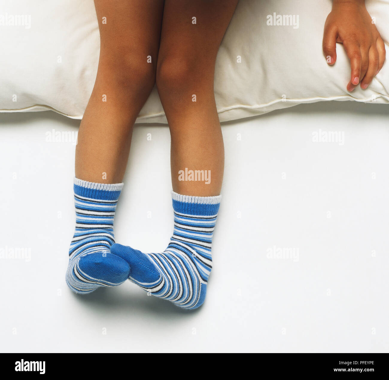 Child getting dressed socks hires stock photography and images Alamy