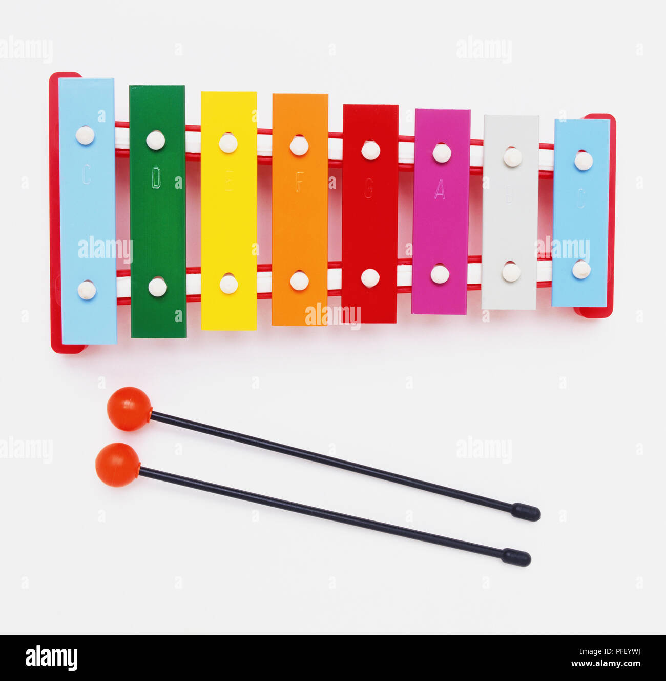 Multicoloured xylophone and sticks, view from above Stock Photo Alamy