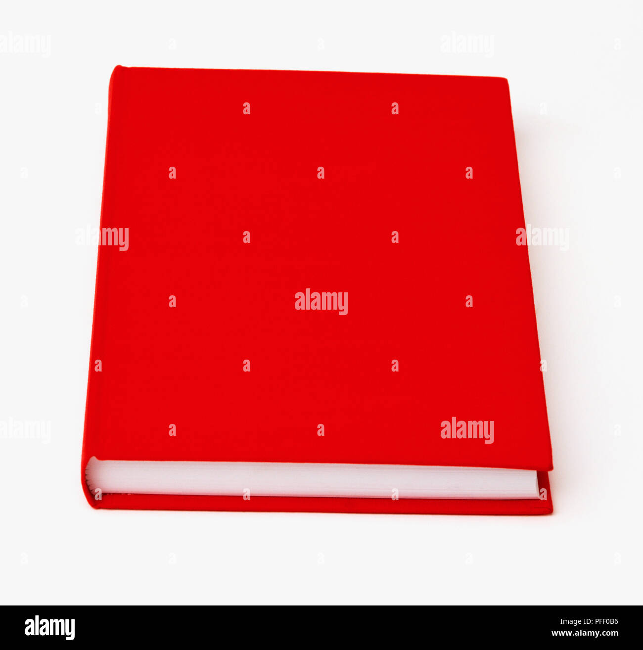 Closed book with plain red cover Stock Photo Alamy