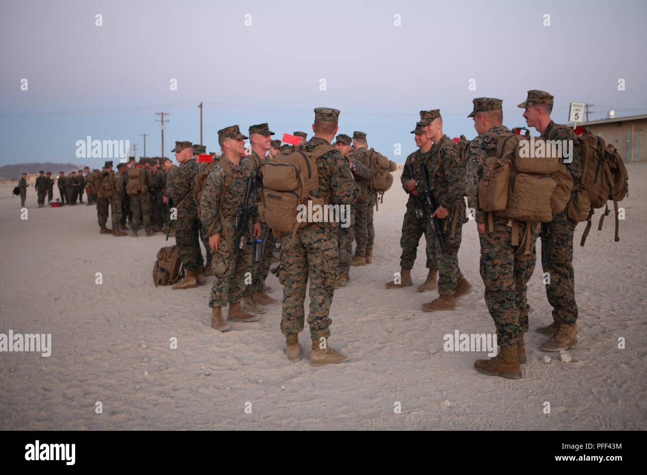 Marines arrive at Camp Wilson in Twentynine Palms, Calif., on June 13