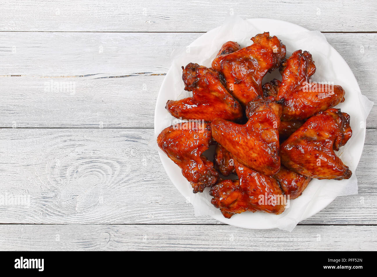delicious crispy deepfried chicken wings marinated with honey, soy