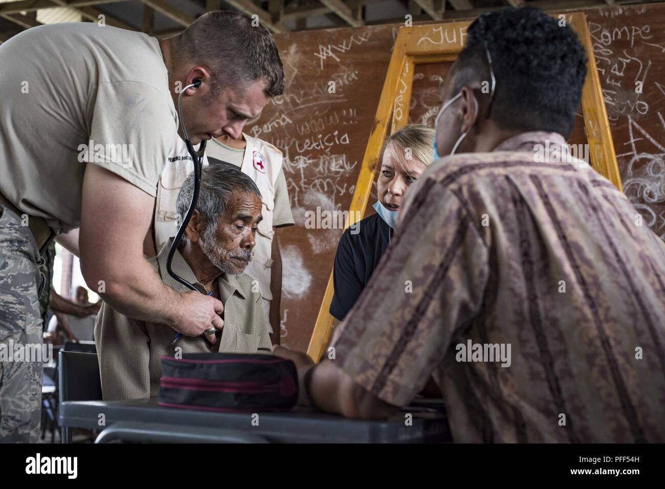 U.S. Air Force Lt. Col. Luke Porsi, left, a 673rd Medical Operations