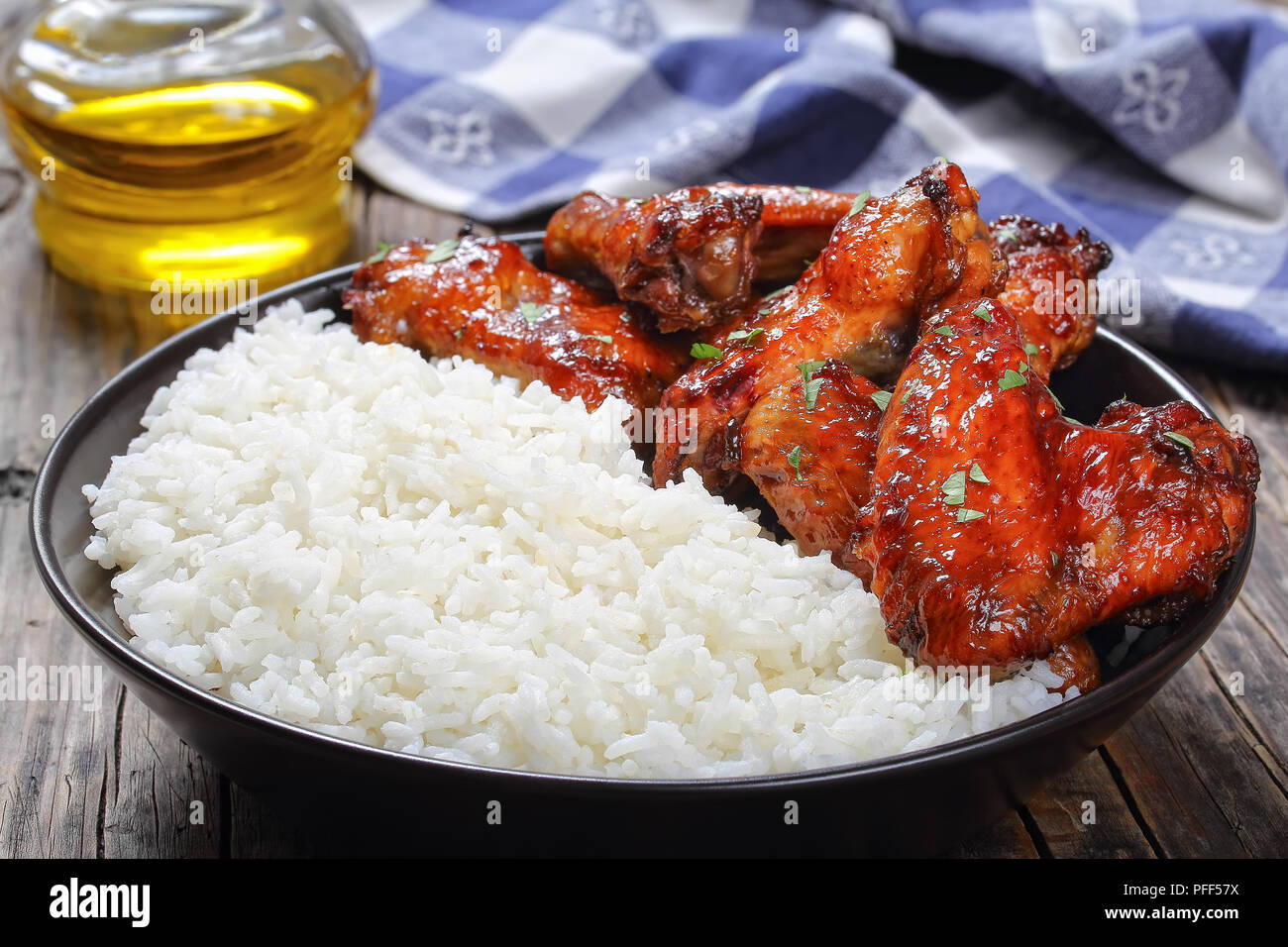 rice with delicious honey garlic ginger glazed chicken wings sprinkled