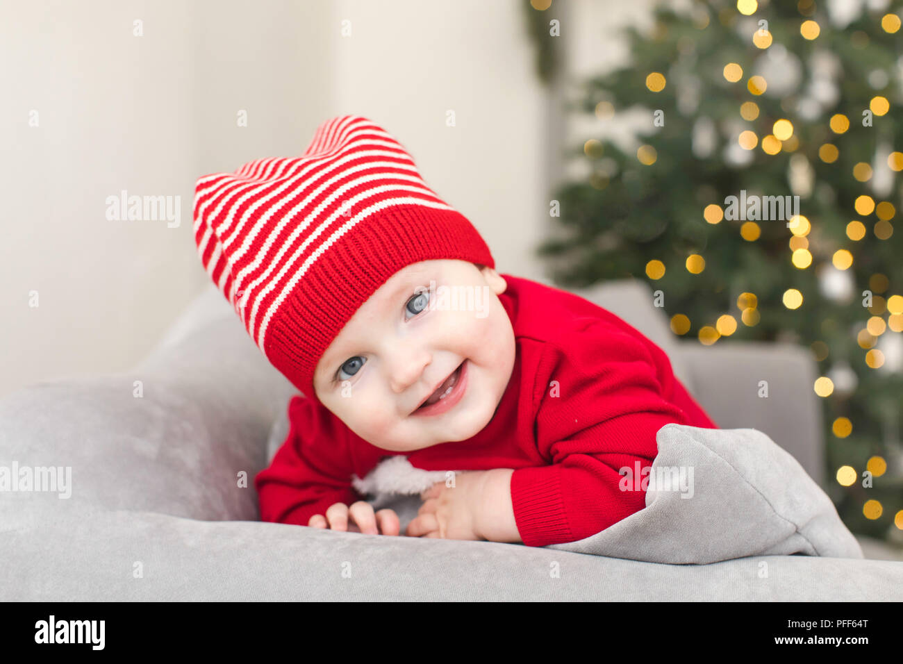 Funny baby in Christmas costume Stock Photo