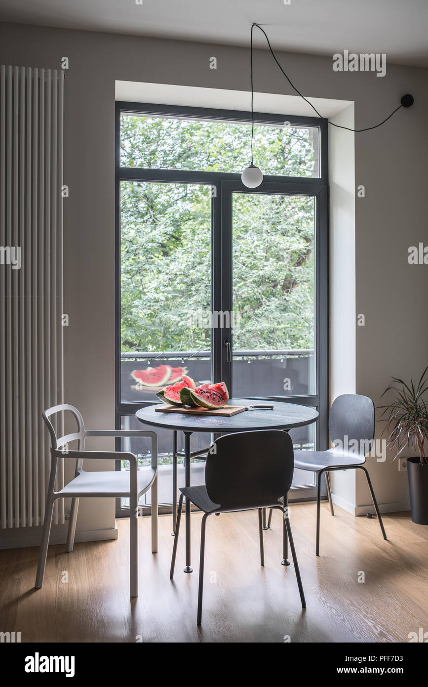 Hall In A Modern Style With Light Walls And Parquet On The