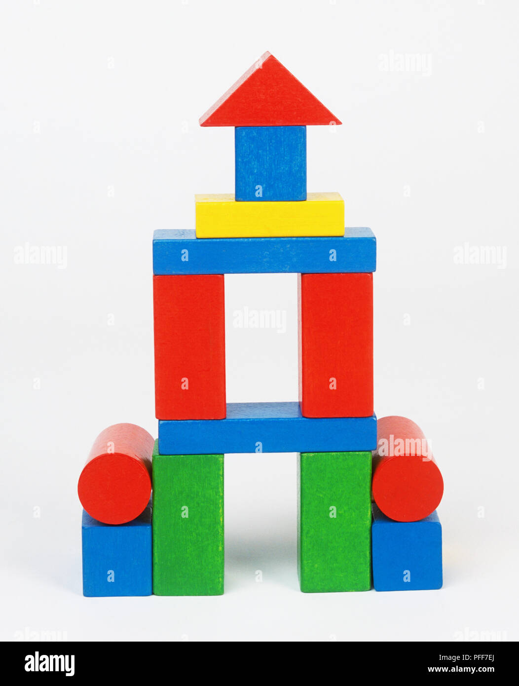 Illustration Of People Building With Balanced Shape Blocks High