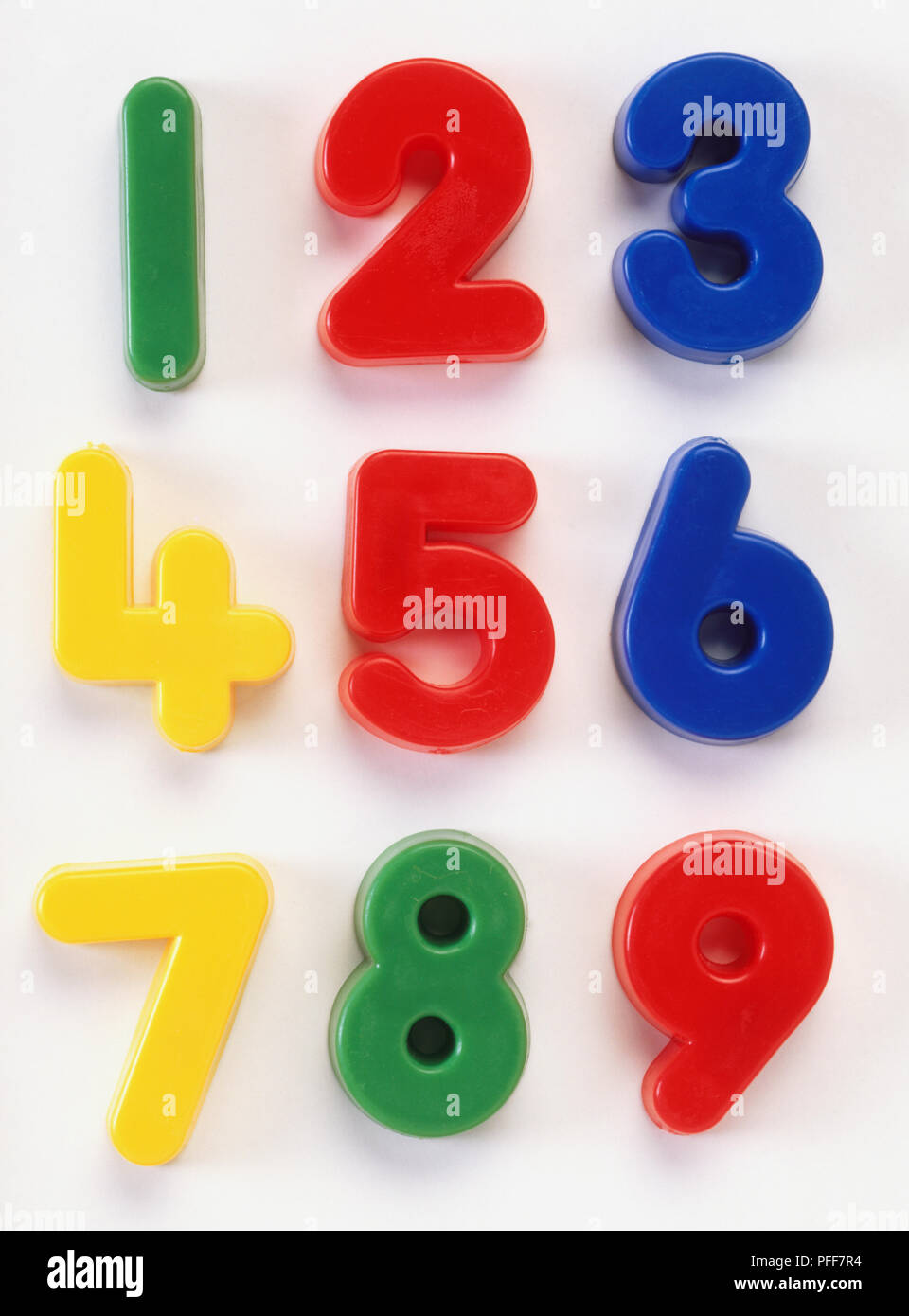 Plastic numbers 1, 2, 3, 4, 5, 6, 7, 8, 9, close up. Stock Photo