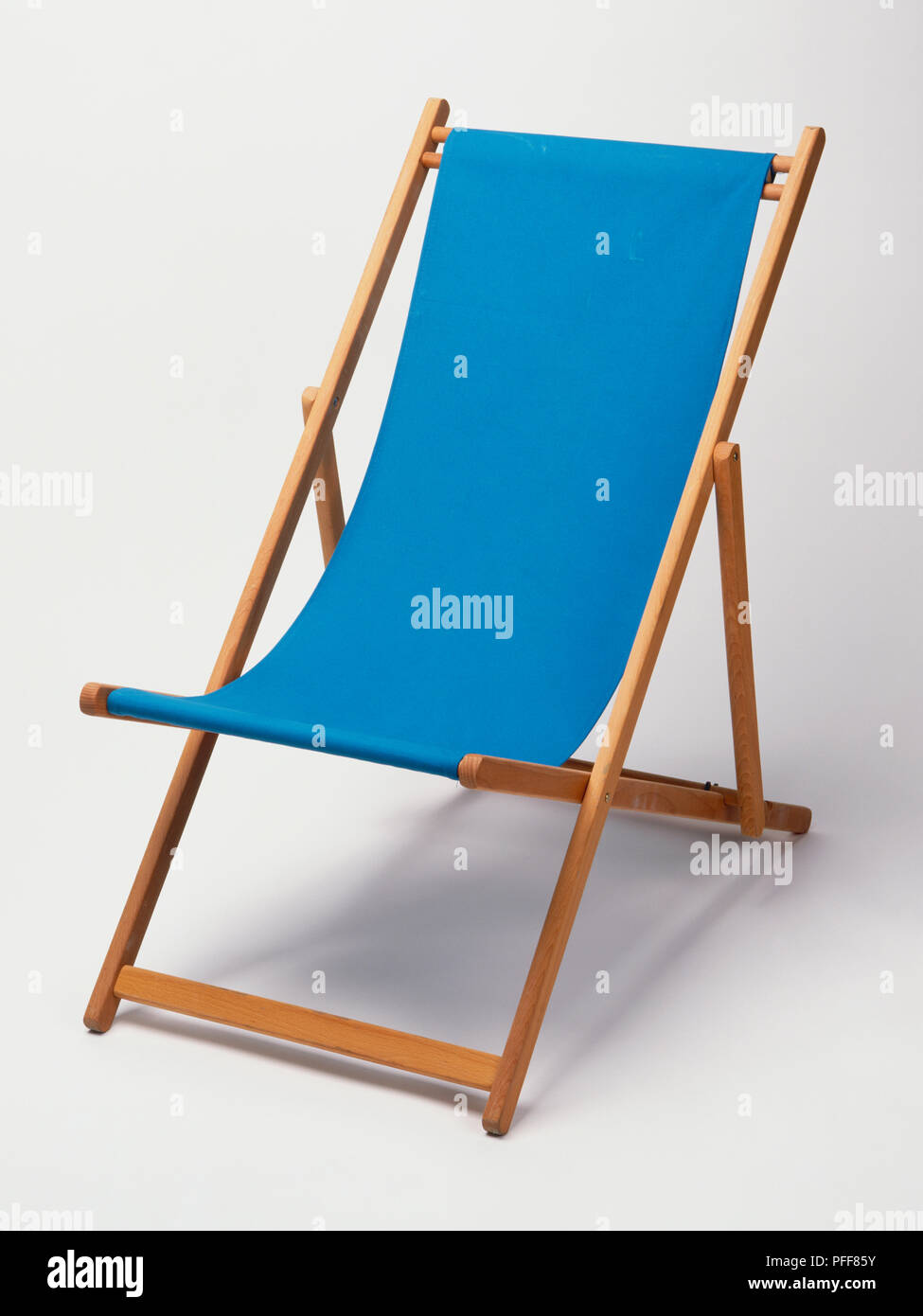 Deck chair, wooden frame, sky blue canvas Stock Photo