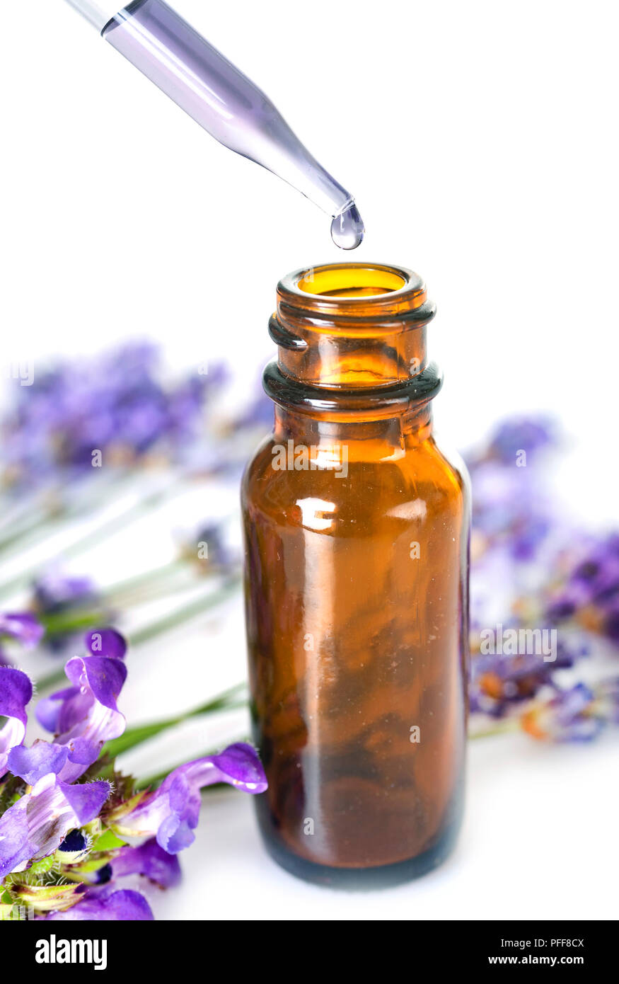 lavender and essential oils in front of white background Stock Photo ...