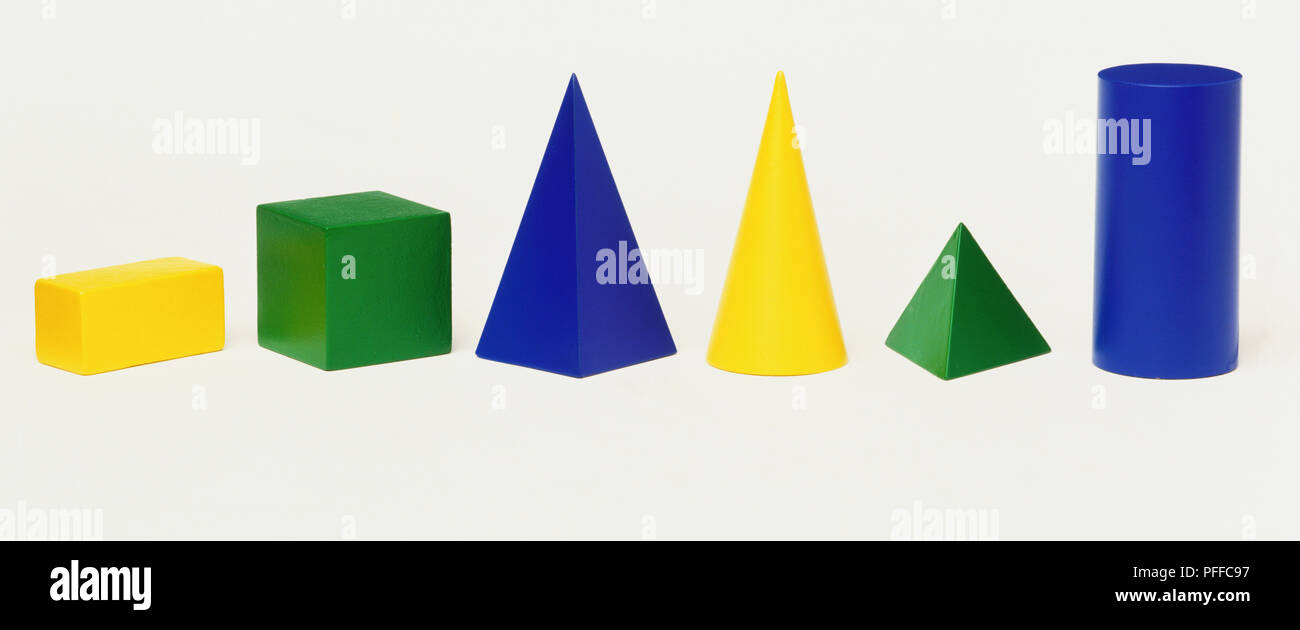 Yellow, blue and green rectangles, squares, cones and triangles. Stock Photo