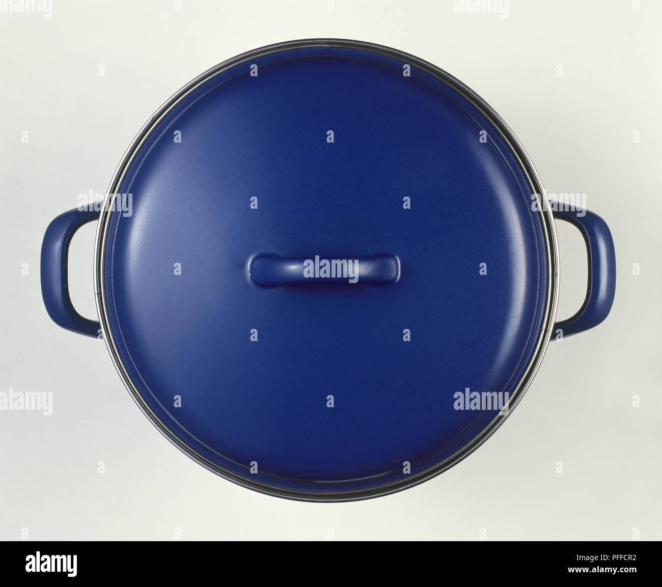 Blue saucepan with lid on Stock Photo