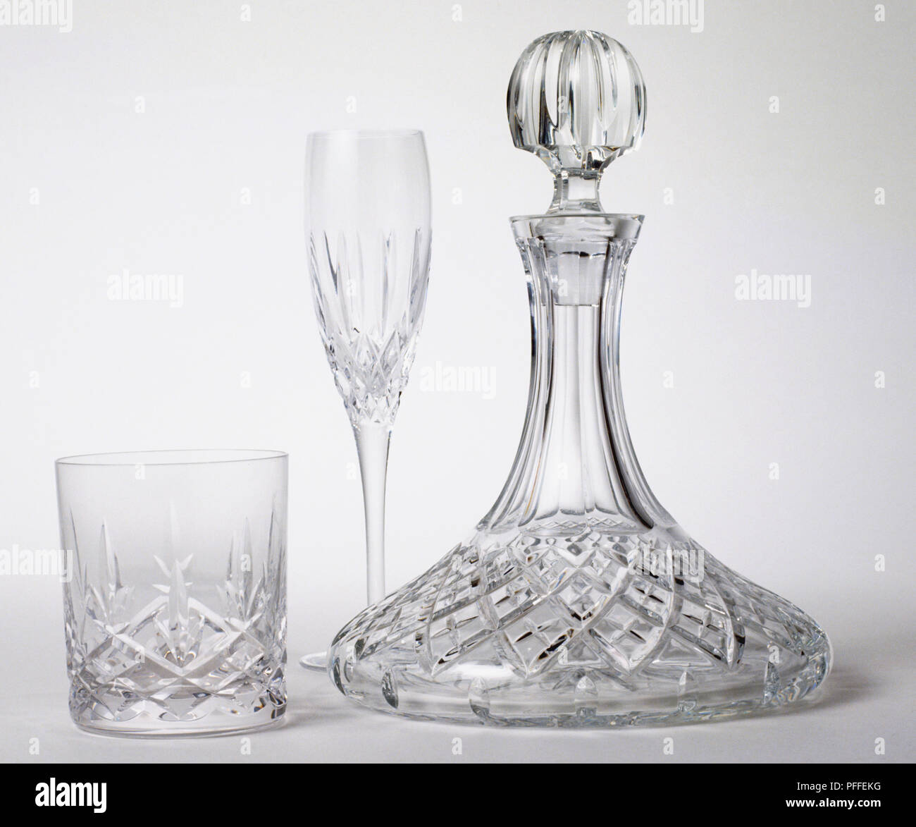 Crystal tableware including tumbler, wine glass and decanter, close up Stock Photo