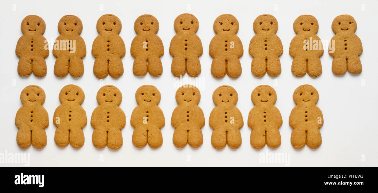 Two rows of gingerbread men. Stock Photo
