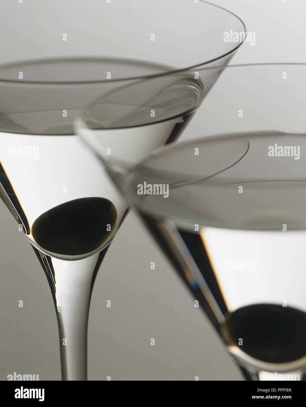 Two clear glasses filled hi res stock photography and images Alamy