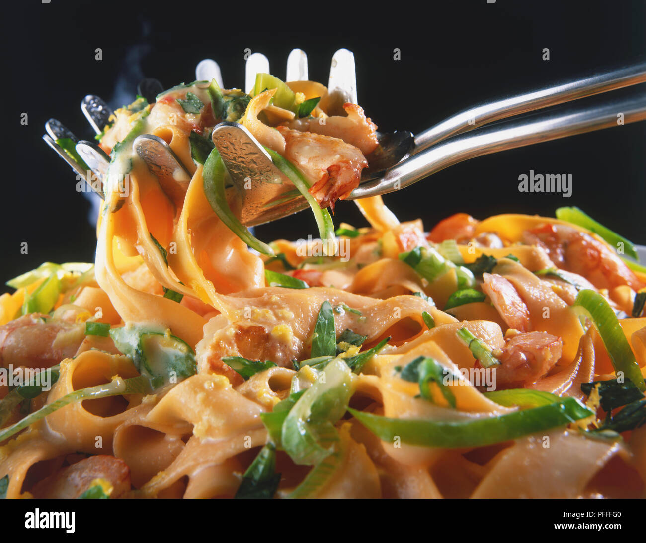 Pasta scoop picking up helping of pasta Stock Photo Alamy
