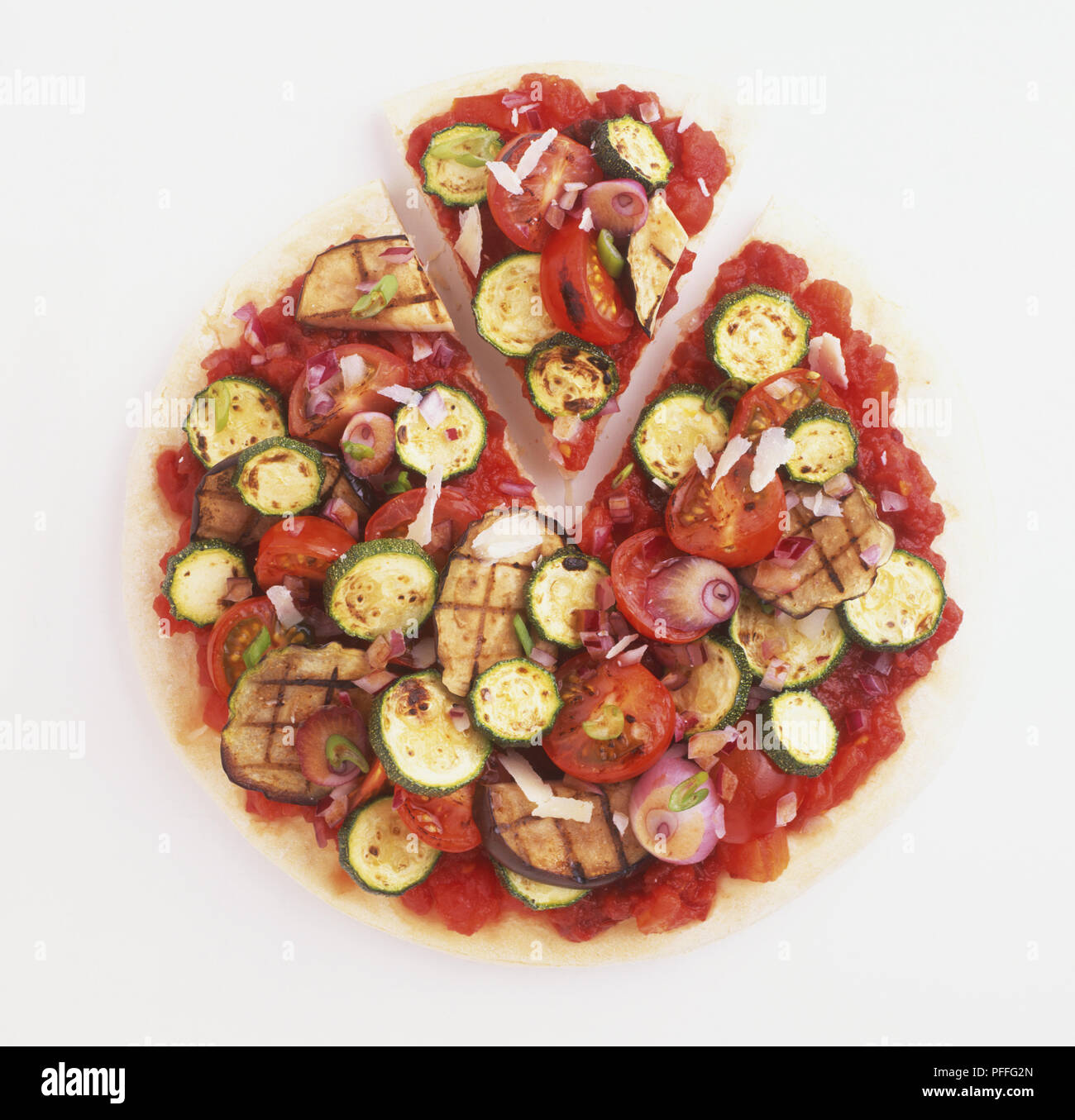 Tomato and red onion pizza. Stock Photo