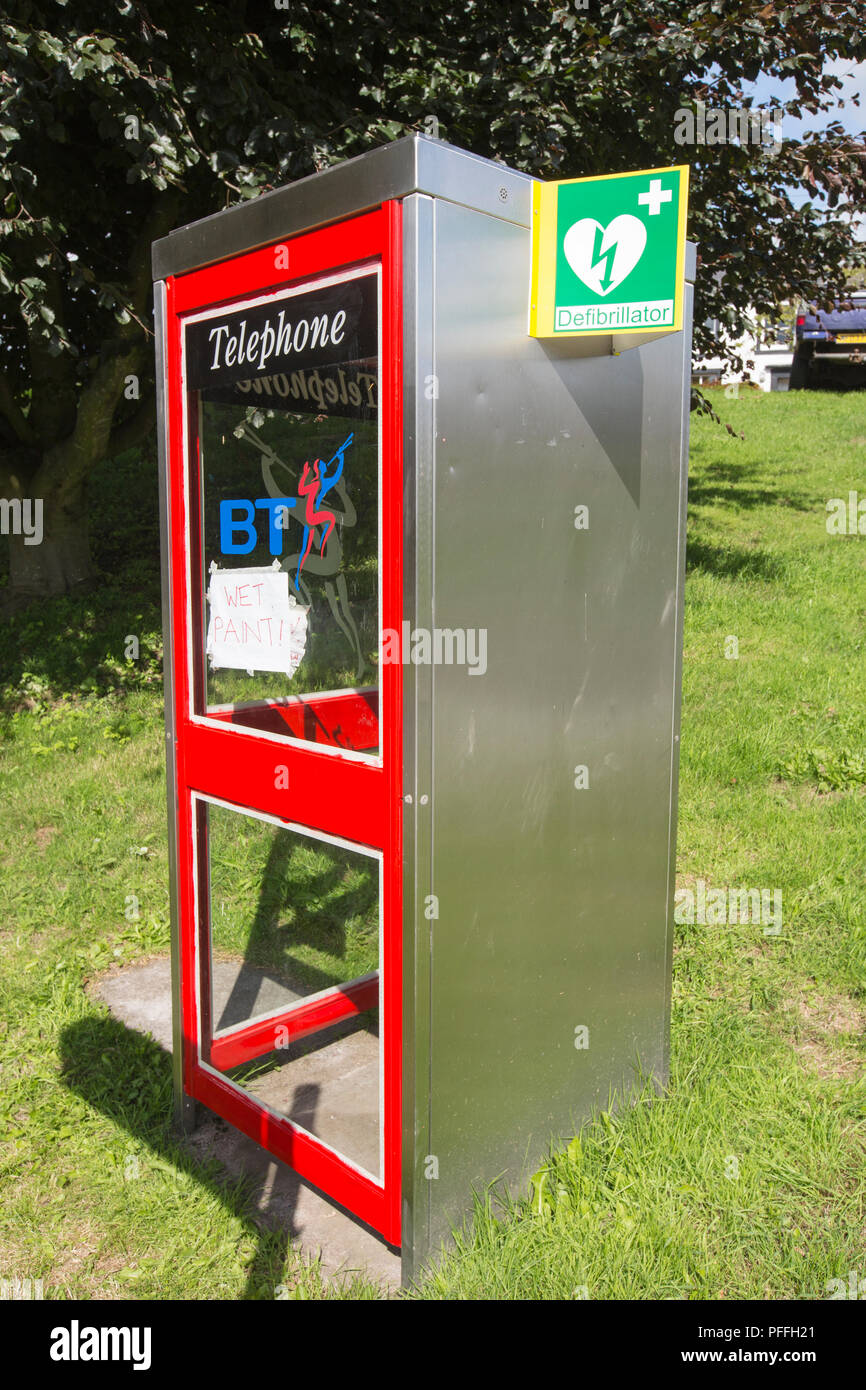 A defibrillator in an old phone box in the village of Skirwith, Eden Valley, Cumbria, UK. Stock Photo