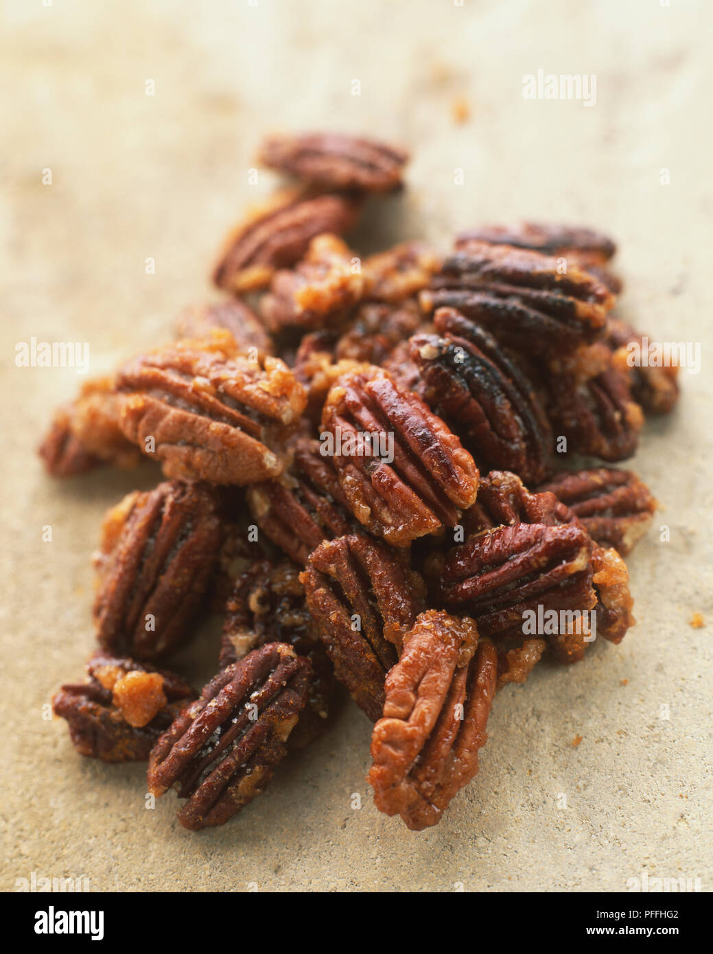 Crunchy sweet and spicy pecan nuts. Stock Photo