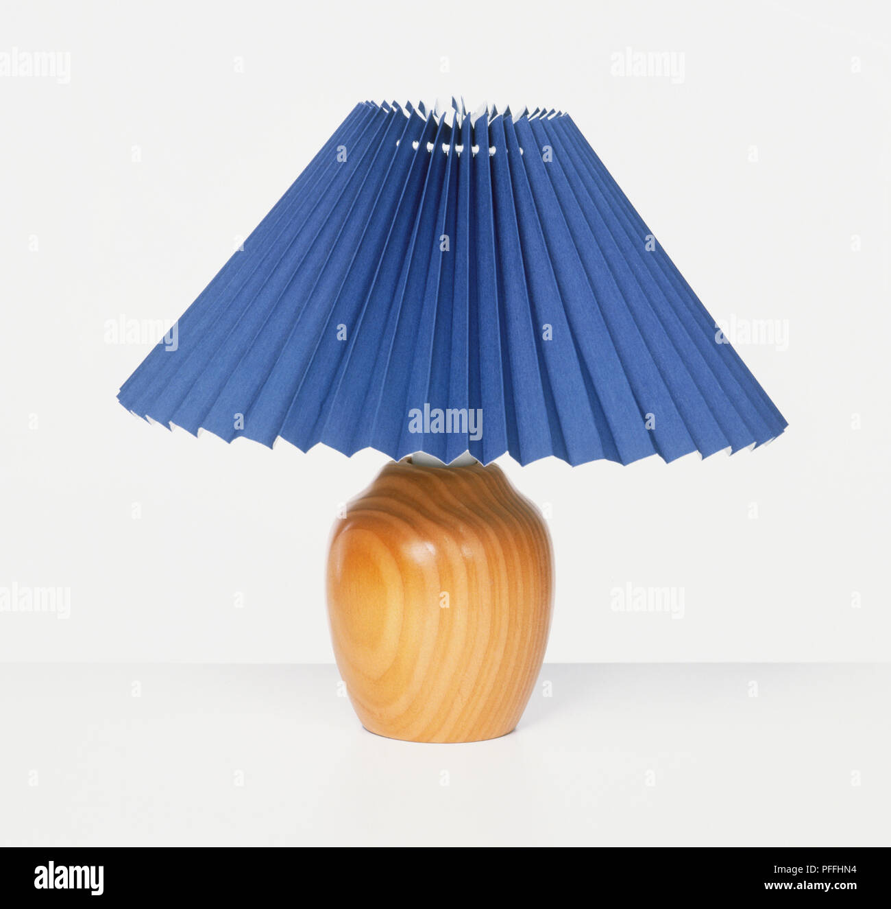 Lamp with folded paper lampshade Stock Photo