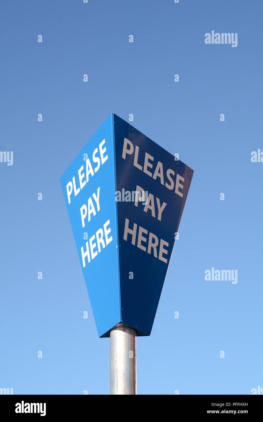 Please Pay Here - sign in car park Stock Photo