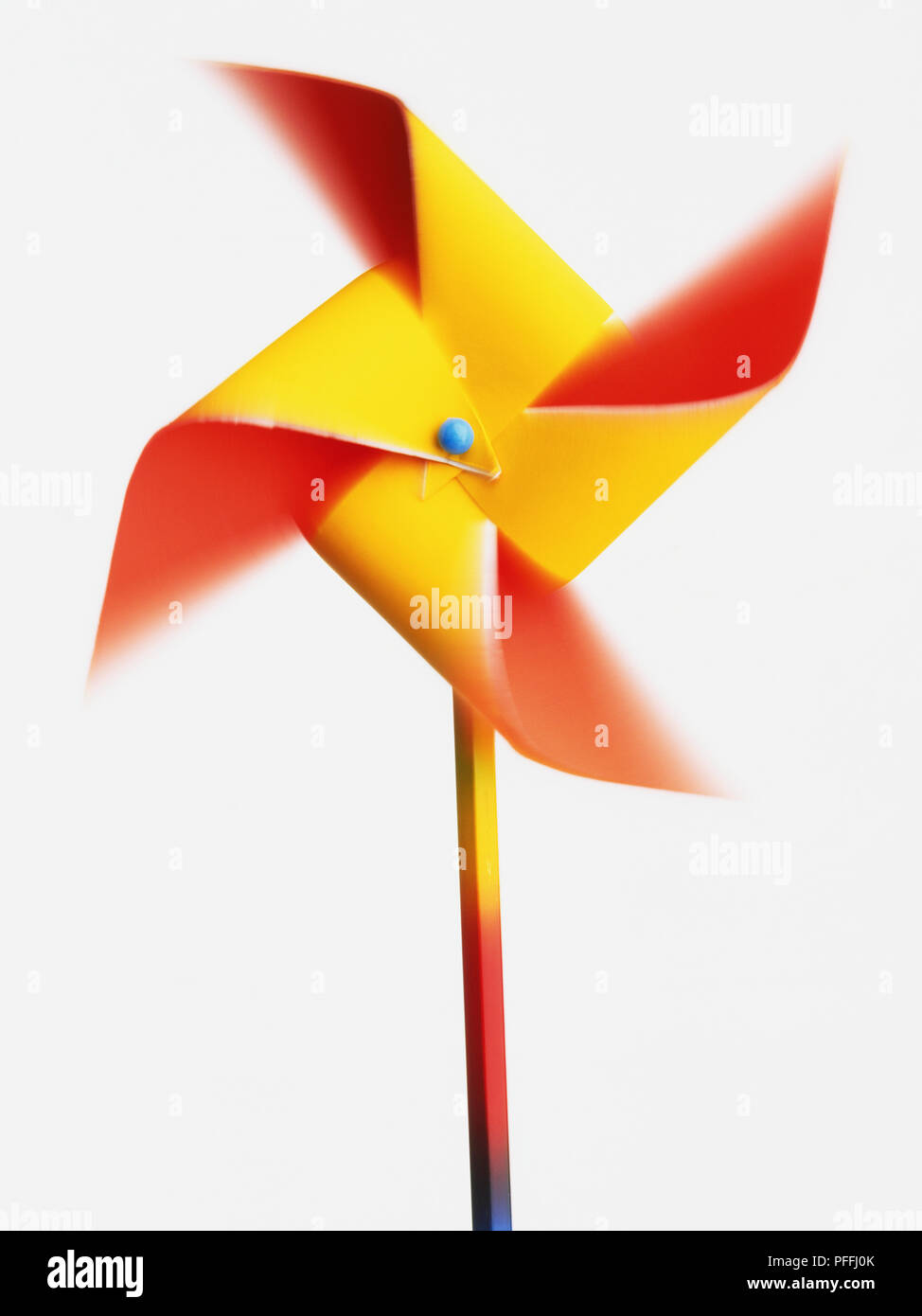 Toy windmill made from yellow and red paper Stock Photo Alamy