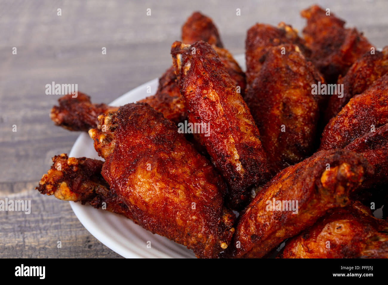 Chicken BBQ wings with spicy sauce Stock Photo - Alamy