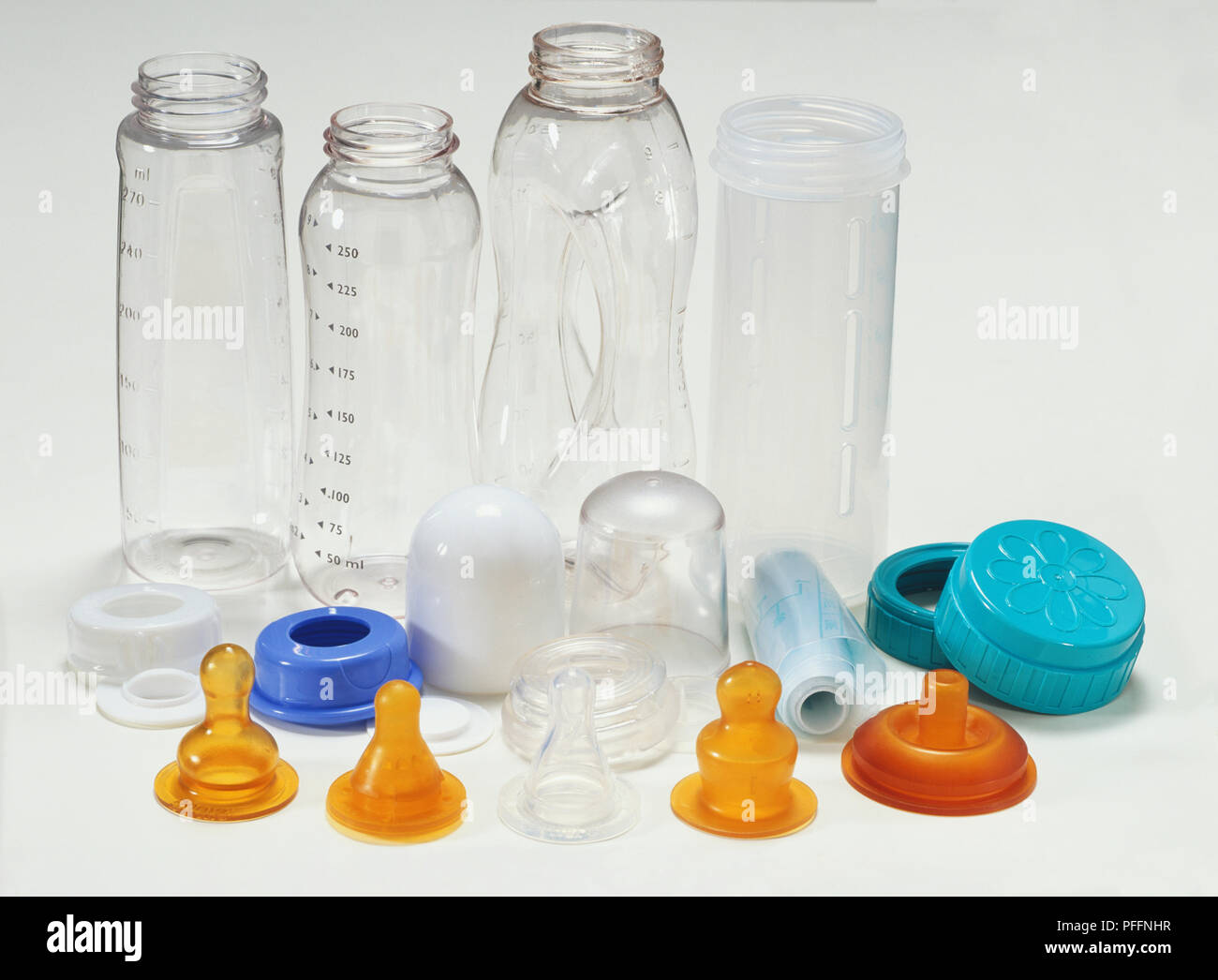 Various glass and plastic baby bottles and teats Stock Photo Alamy