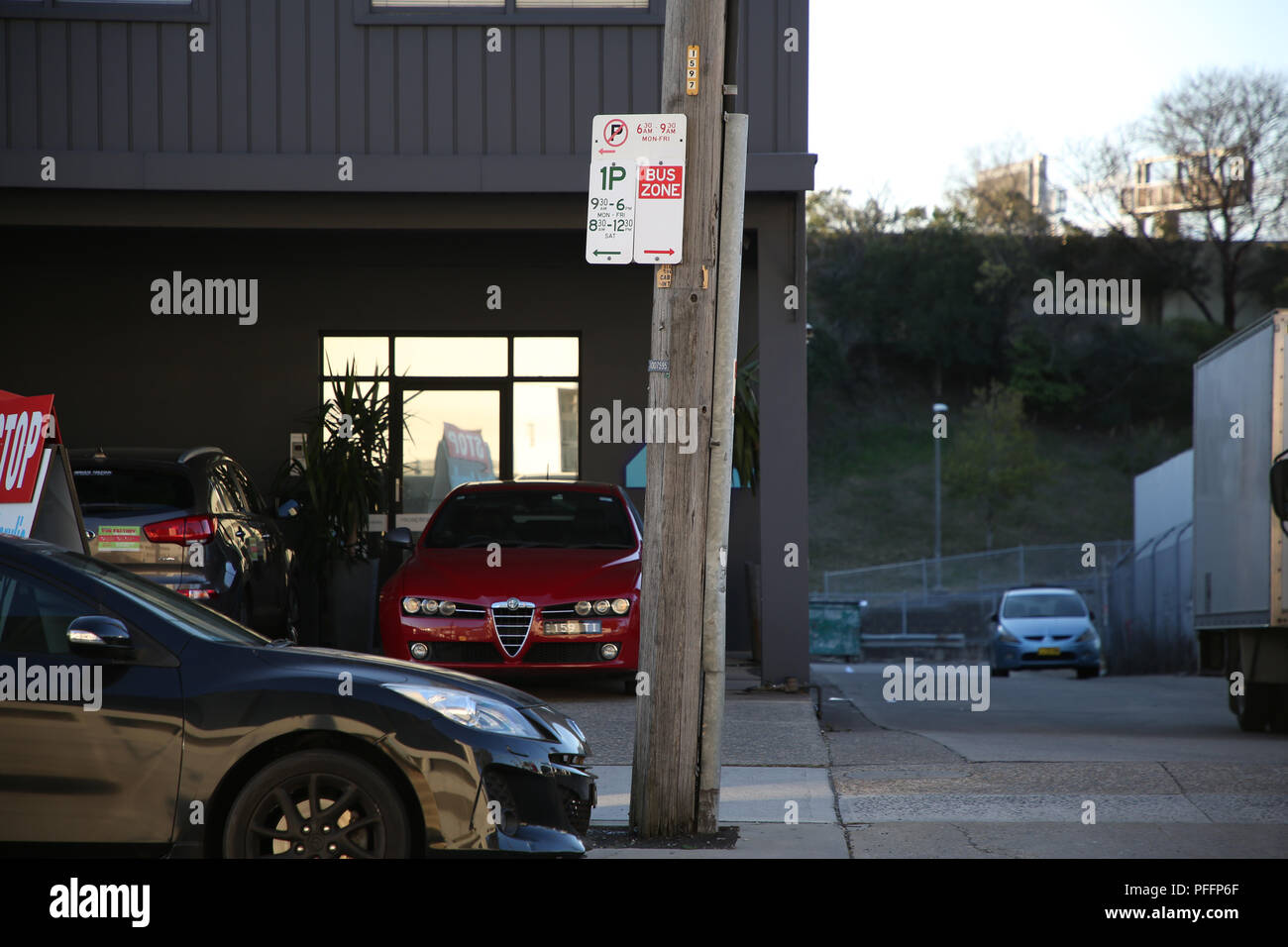 1P parking sign and bus zone sign, Vanessa Street, Kingsgrove, Sydney, NSW, Australia Stock