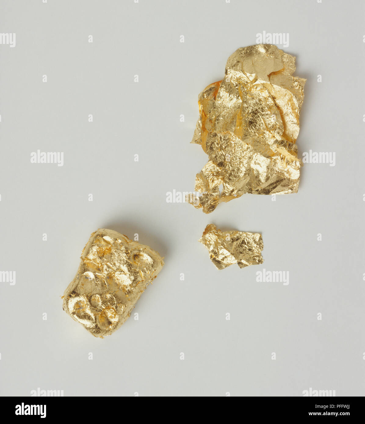 Three lumps of gold, close up Stock Photo