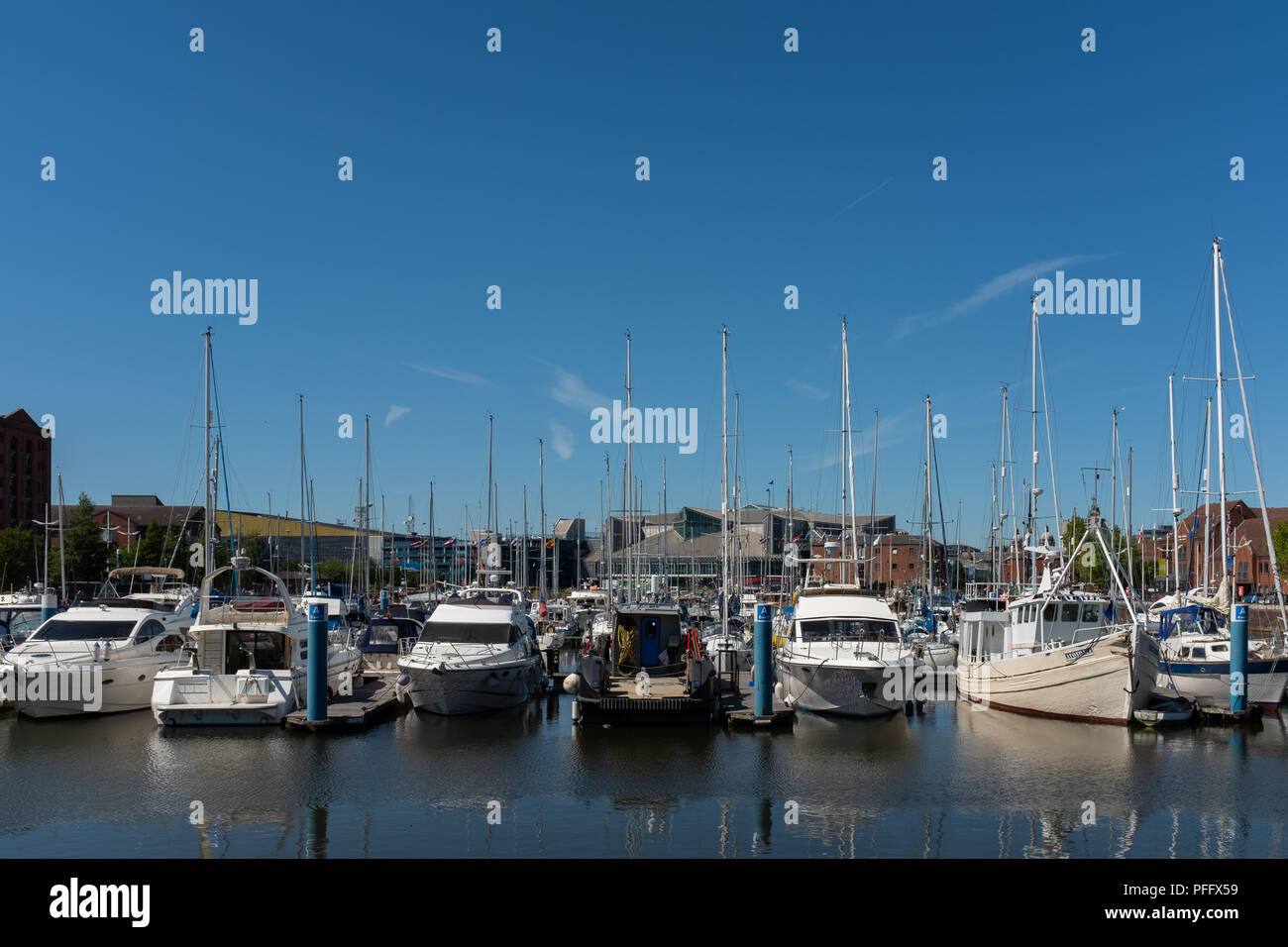 Image of Kingston Upon Hull UK City of Culture 2017. Shown around Humber Dock and Marina are the flags of different nations and baots docked. Stock Photo