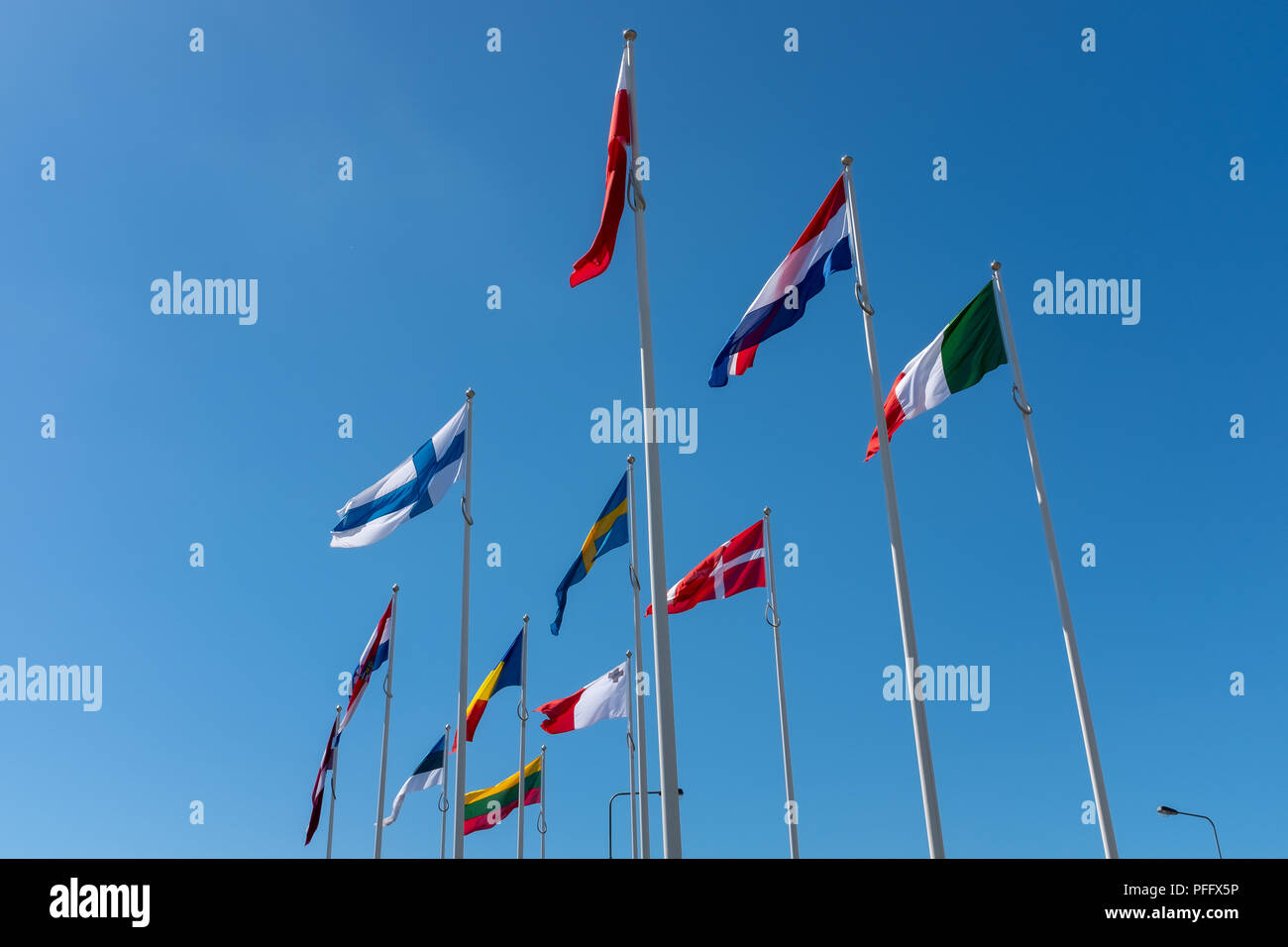 Image of Kingston Upon Hull UK City of Culture 2017. Shown around Humber Dock and Marina are the flags of different nations and baots docked. Stock Photo