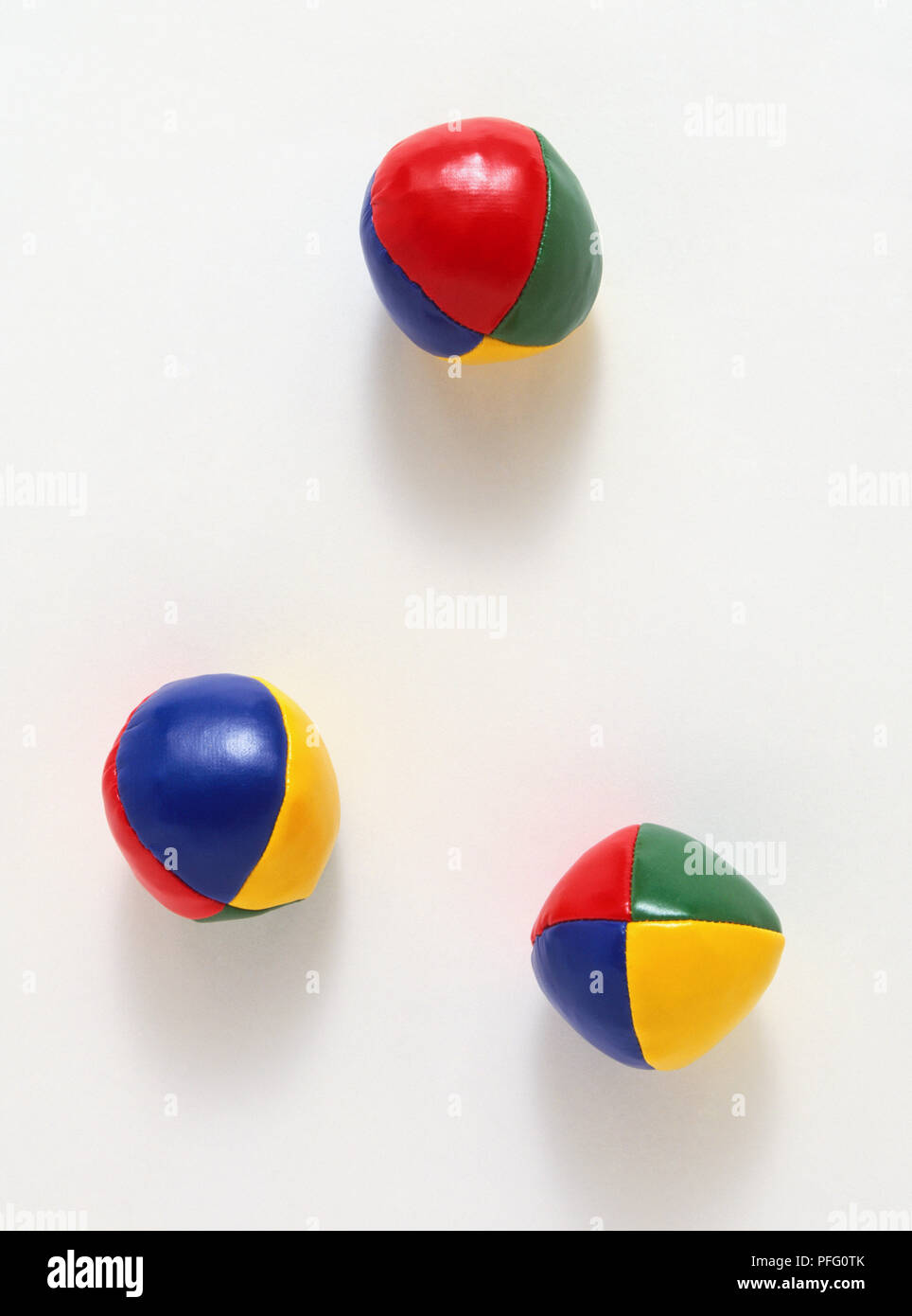 Three multi-coloured juggling balls Stock Photo