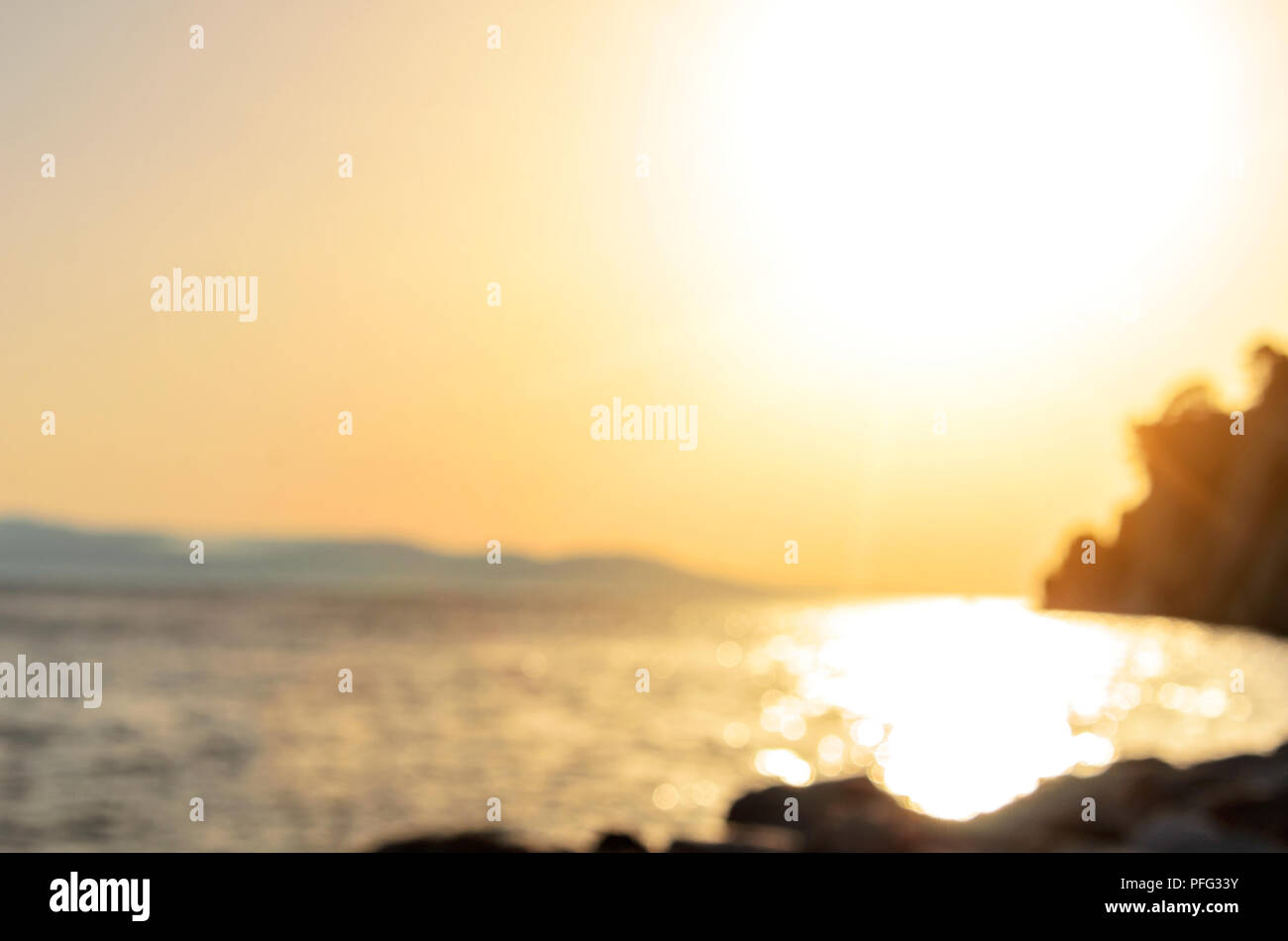 Sunset at the sea. The picture is in the defocus. Stock Photo