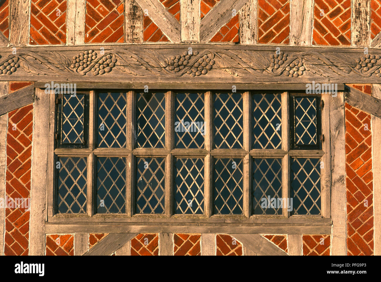 Great Britain, England, Suffolk, Aldeburgh, 16th century Moot Hall, facade detail showing window and timber frame, close-up Stock Photo