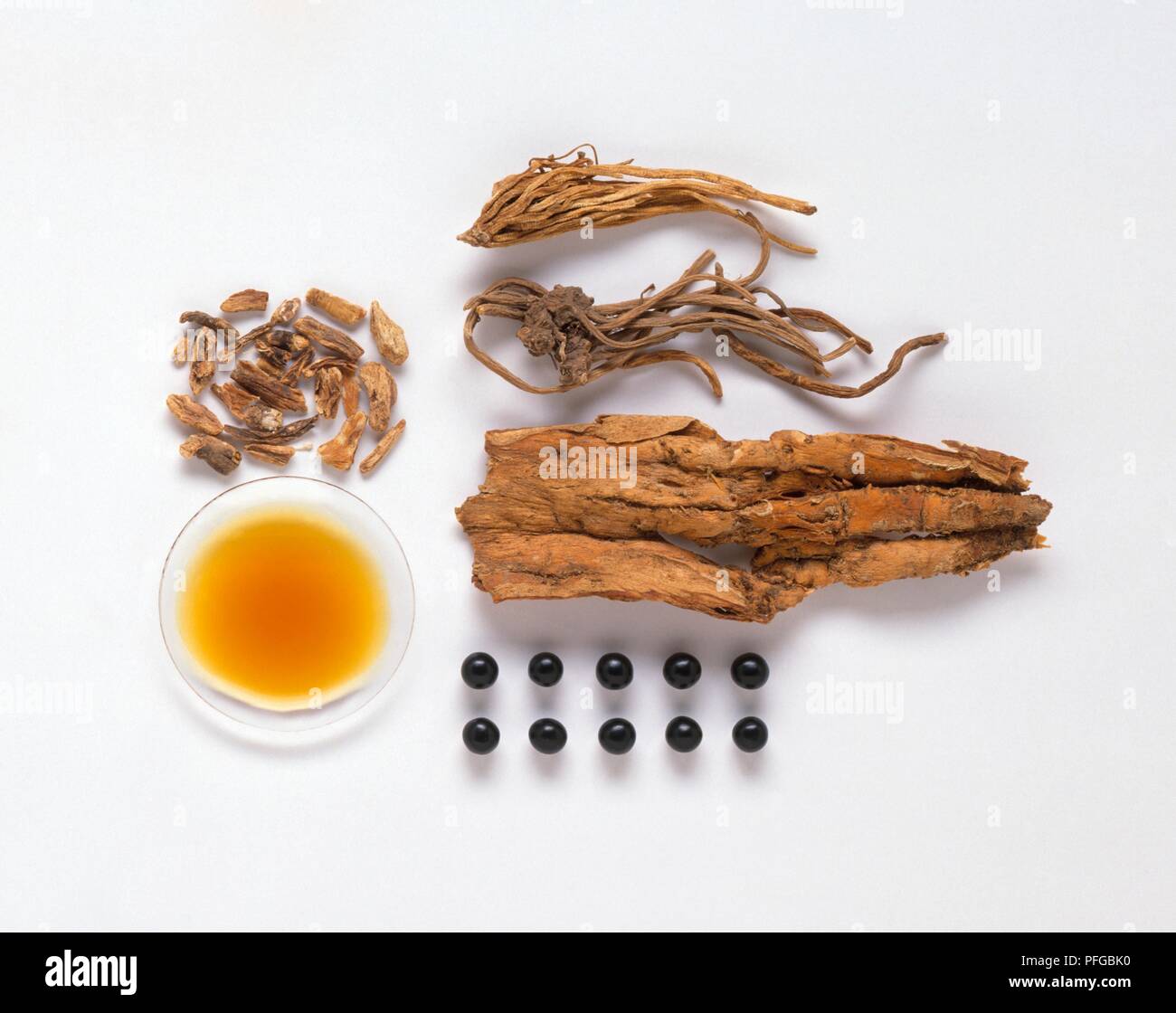 Dried root and tincture from Gentiana lutea, roots from Gentiana macrophylla (Qin jiao), root from Gentiana scabra (Long dan cao), and pills (Long dan xie gan wan) Stock Photo