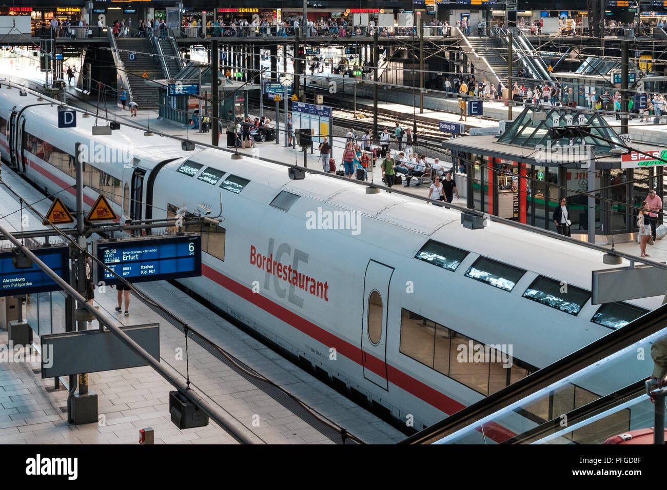 Hamburg, Germany - august, 2018: Trains and passengers at main railway station in Hamburg Stock Photo