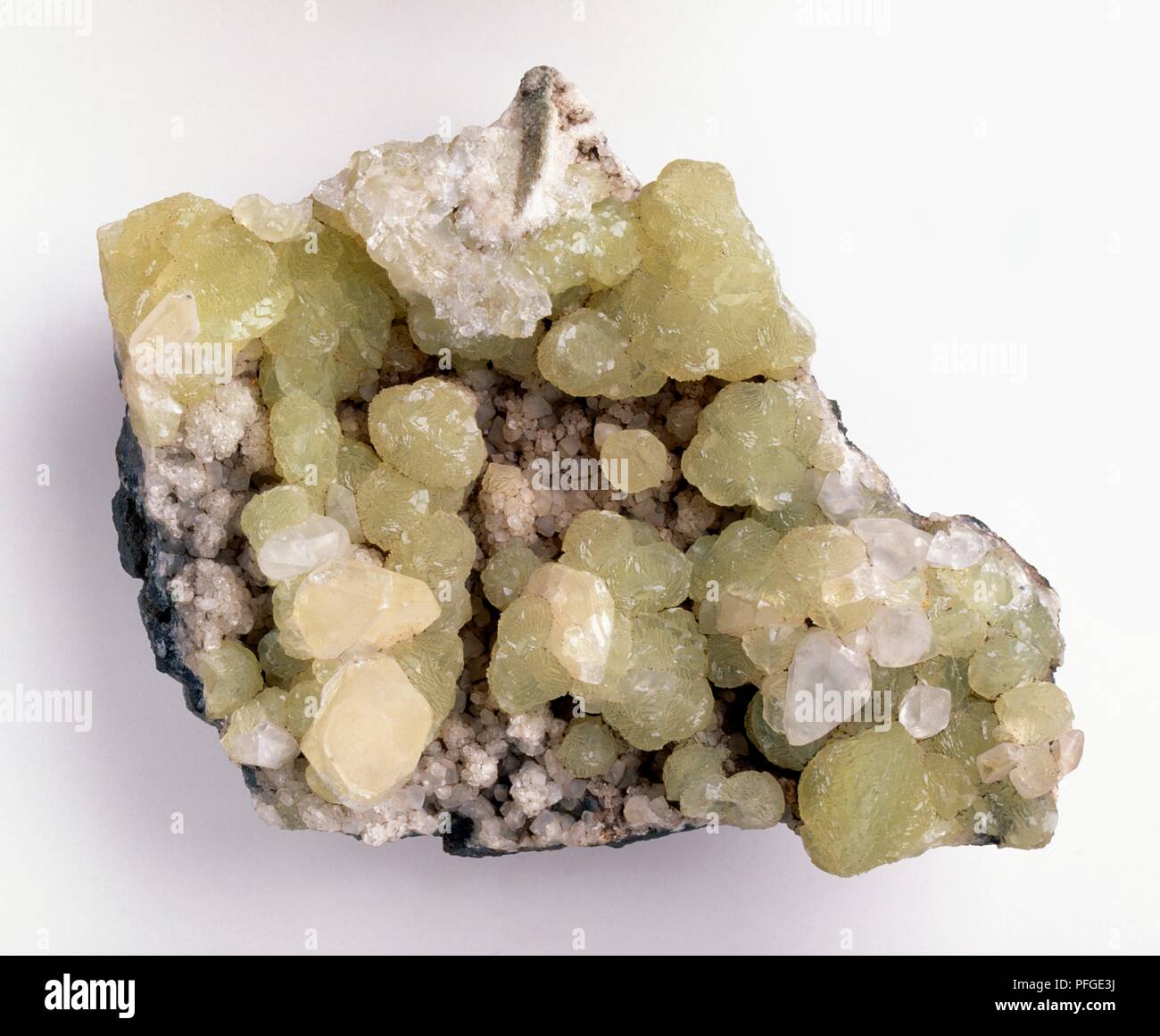 Prehnite crystals and massive calcite in groundmass Stock Photo