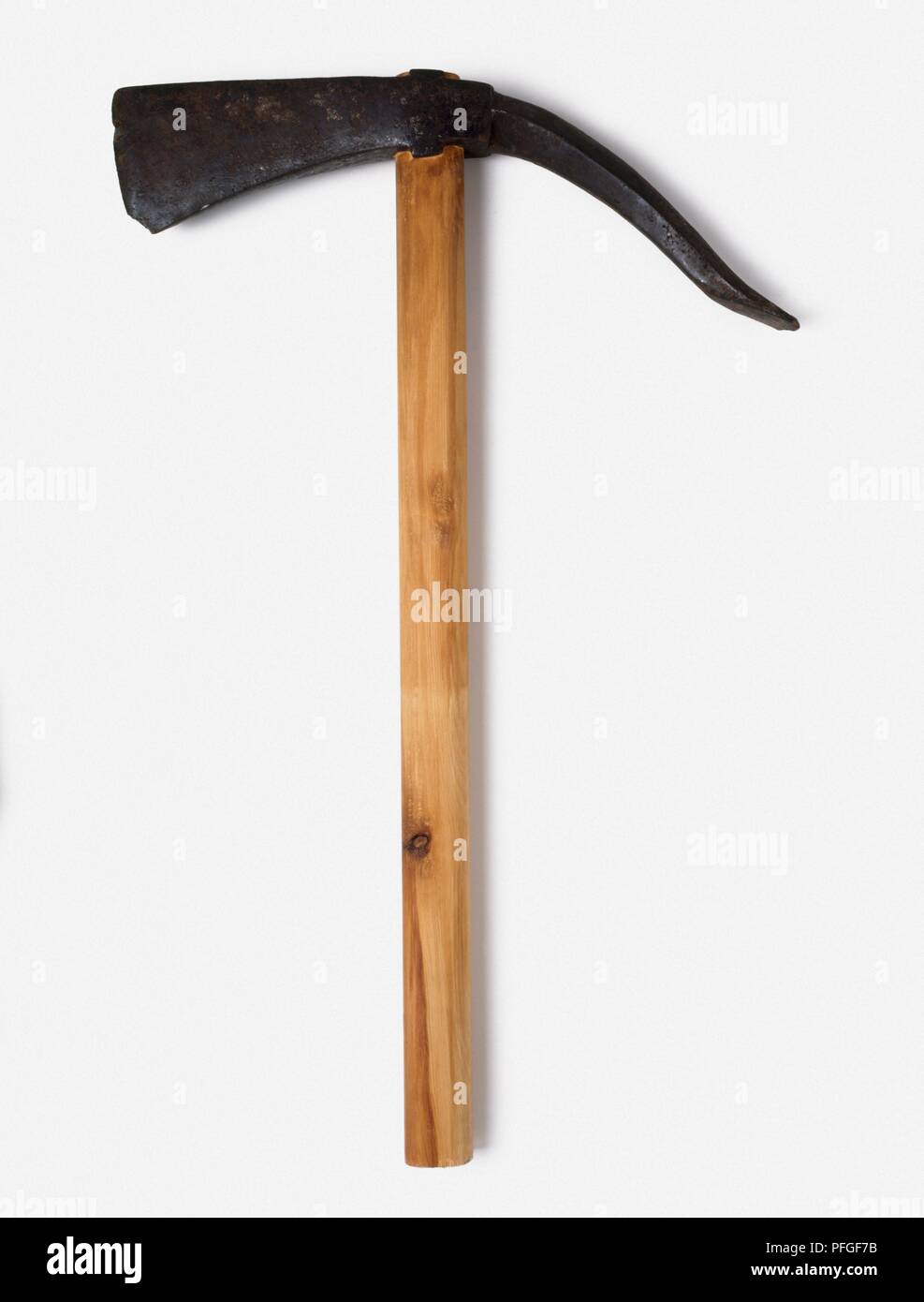Ancient Roman pick axe with a modern handle Stock Photo