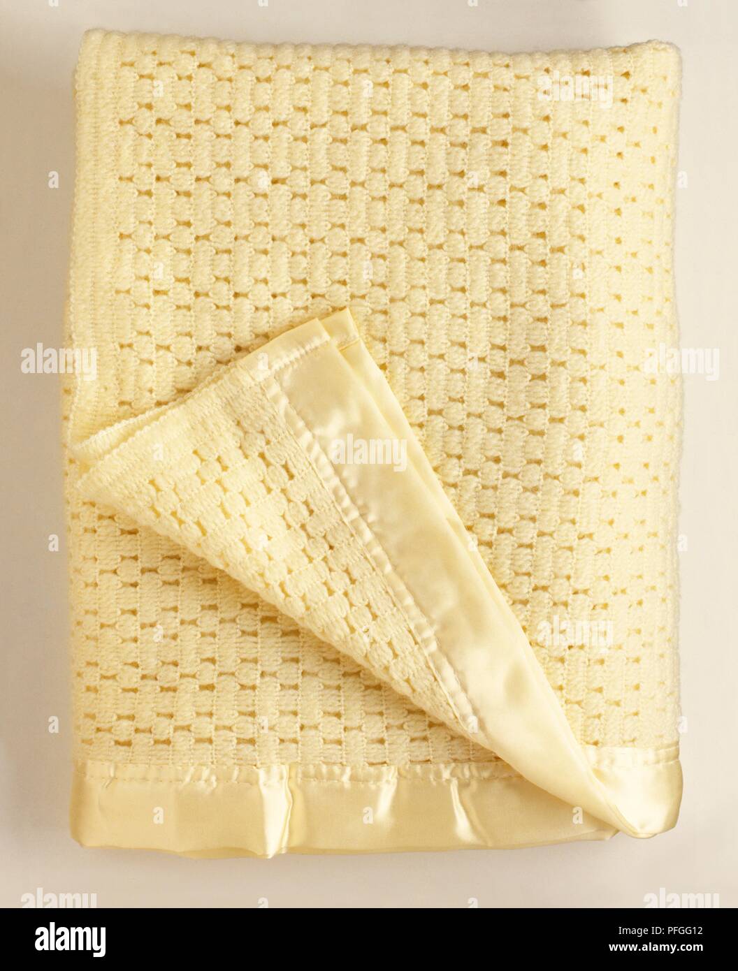 Cellular blanket folded up Stock Photo