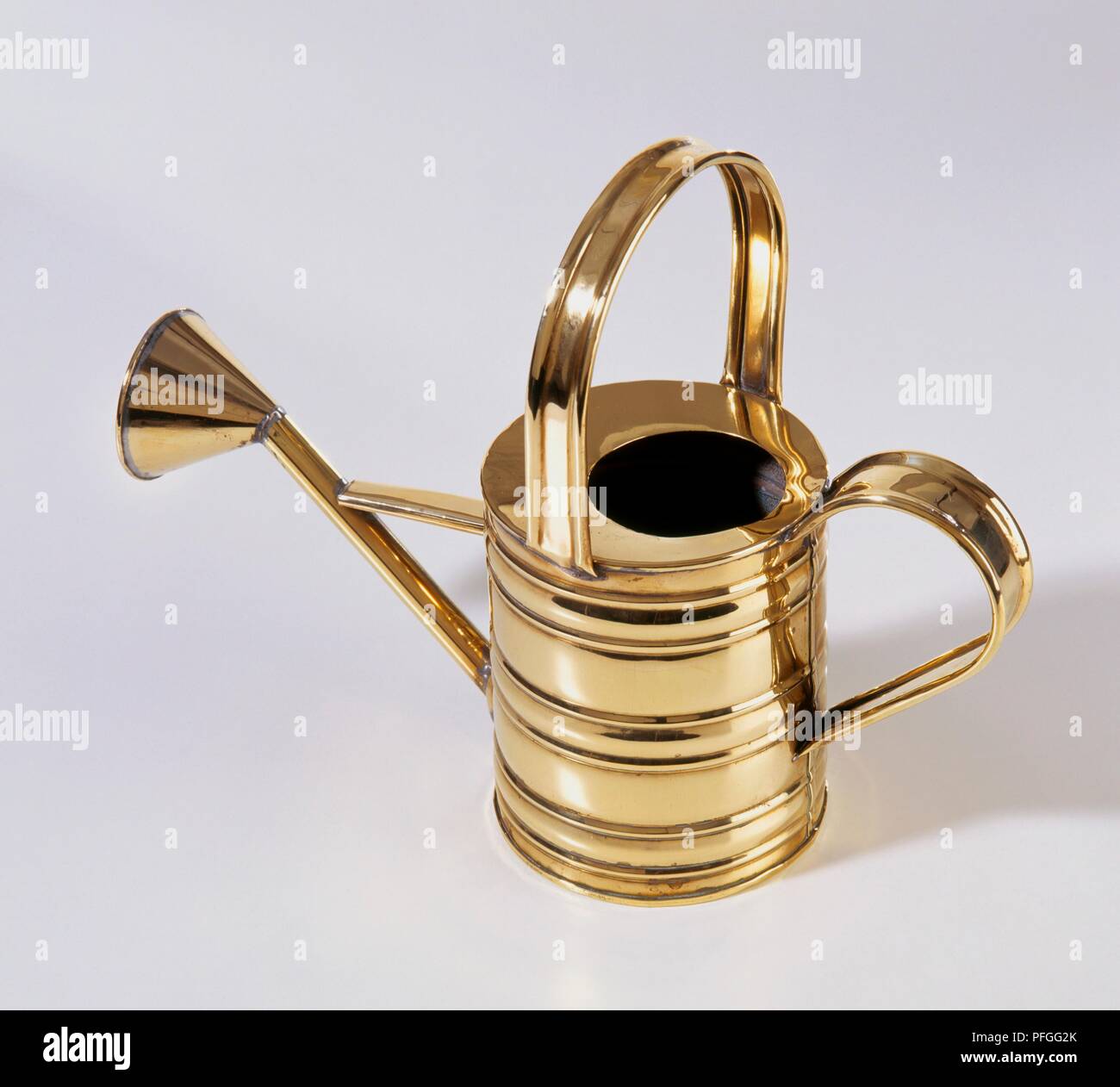 Small brass watering can Stock Photo Alamy