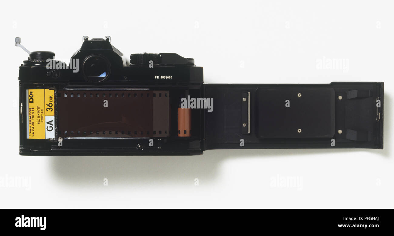 35mm film loaded into a camera with open back door Stock Photo - Alamy