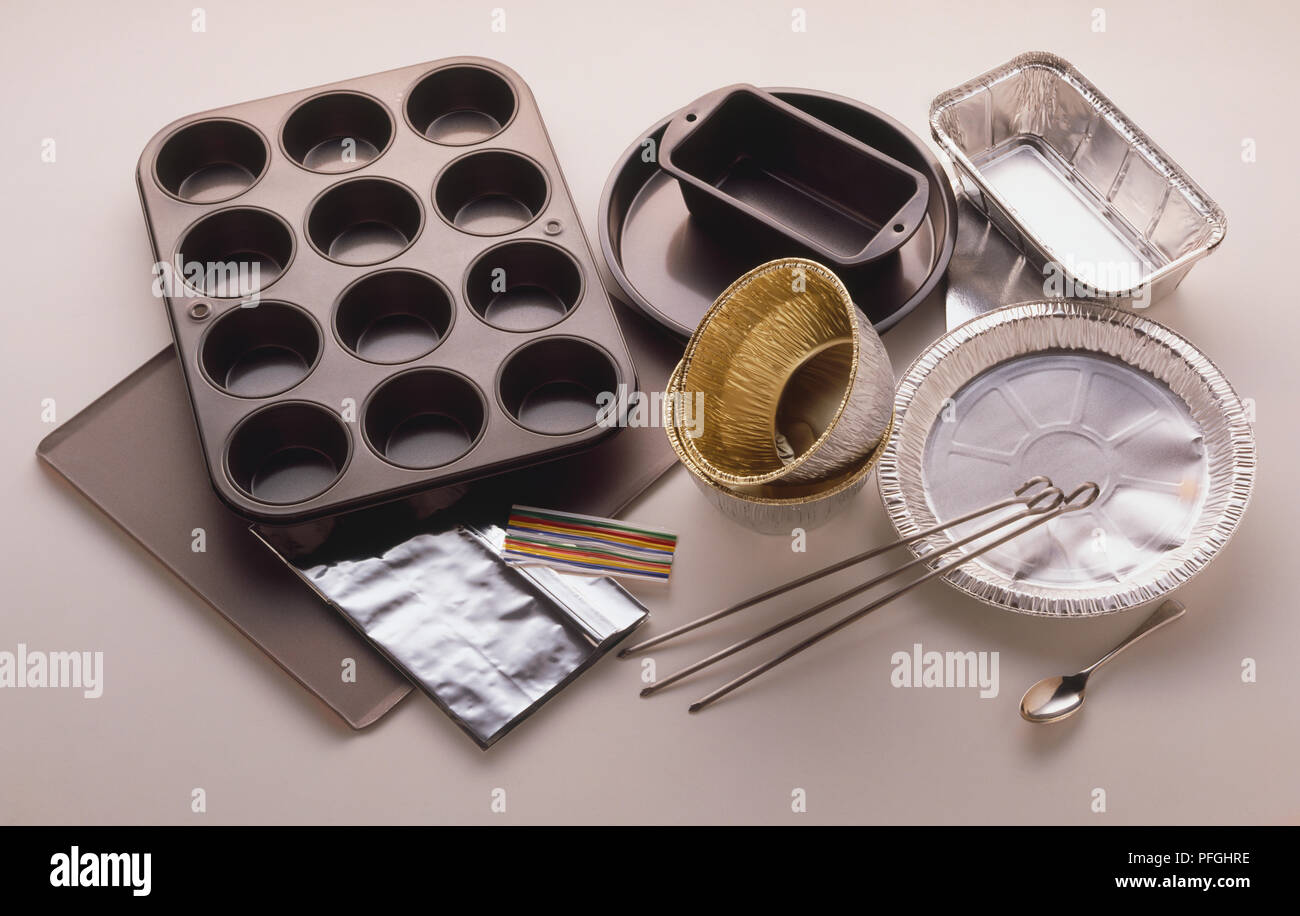 Selection of metal and foil oven cookware Stock Photo