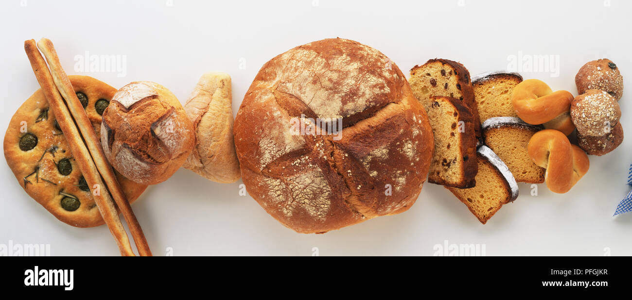 Selection of traditional Italian breads and cakes, including bread sticks,  olive focaccia, rye bread, corn bread, country loaf, panettone, pandoro and  sweet bread rolls, view from above Stock Photo - Alamy