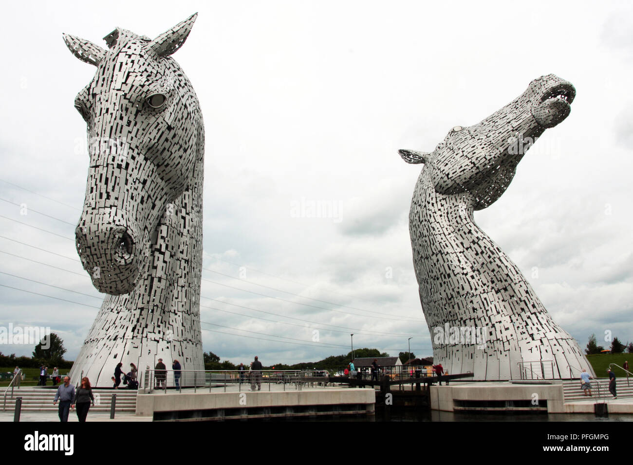 The two huge Kelpie horse sculptures that sit on the Forth and Clyde canal in Helix Park, Falkirk in Scotland. They were designed and built by Andy Scott and are now a major Scottish attraction with tourists and visitors. Stock Photo